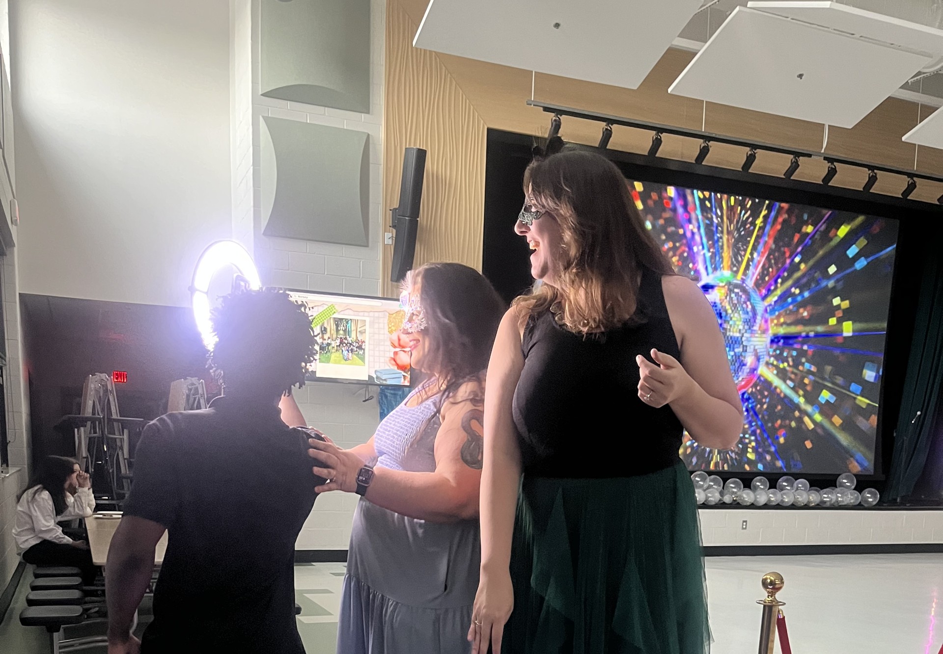 Two guests on the Carolina 360 photo booth platform